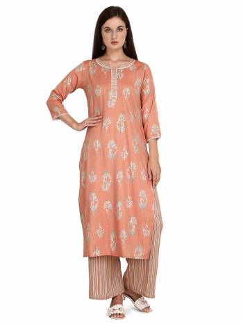 Looking This Readymade Long Kurti With Bottom In Fine Color Fabricated On Rayon Beautified With Designer Printed. It Is Light In Weight And Easy To Carry All Day Long. 