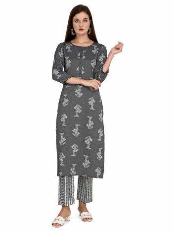 Looking This Readymade Long Kurti With Bottom In Fine Color Fabricated On Rayon Beautified With Designer Printed. It Is Light In Weight And Easy To Carry All Day Long. 