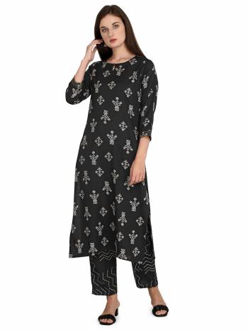 Looking This Readymade Long Kurti With Bottom In Fine Color Fabricated On Rayon Beautified With Designer Printed. It Is Light In Weight And Easy To Carry All Day Long. 