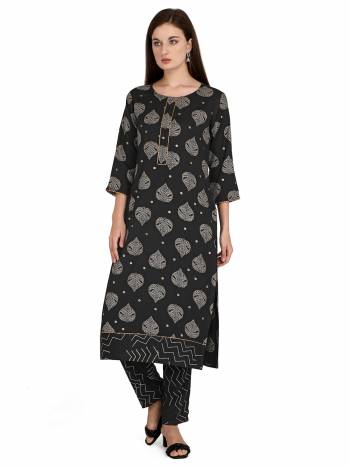 Looking This Readymade Long Kurti With Bottom In Fine Color Fabricated On Rayon Beautified With Designer Printed. It Is Light In Weight And Easy To Carry All Day Long. 