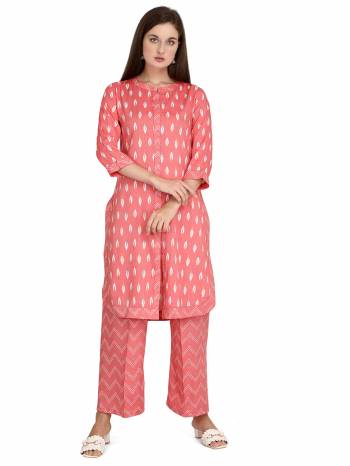 Looking This Readymade Long Kurti With Bottom In Fine Color Fabricated On Rayon Beautified With Designer Printed. It Is Light In Weight And Easy To Carry All Day Long. 