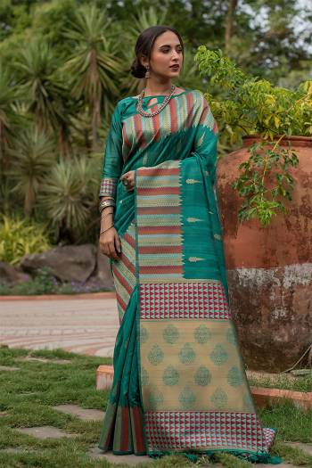 Garb This Designer Partywear Saree Are Fine Saree Paired With Blouse.This Saree And Blouse Are Tussar Silk Based Fabric With Wevon Designer Palu Border Work. Buy This Pretty Saree Now.