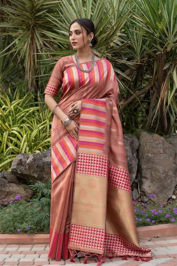 Garb This Designer Partywear Saree Are Fine Saree Paired With Blouse.This Saree And Blouse Are Tussar Silk Based Fabric With Wevon Designer Palu Border Work. Buy This Pretty Saree Now.