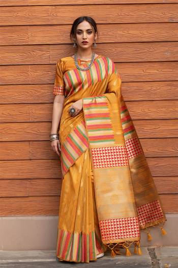 Garb This Designer Partywear Saree Are Fine Saree Paired With Blouse.This Saree And Blouse Are Tussar Silk Based Fabric With Wevon Designer Palu Border Work. Buy This Pretty Saree Now.