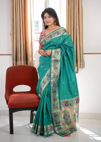 Classic Designer Partywear Saree Are Fine Color Paired With Blouse.This Saree And Blouse Are Banarasi Silk Based Fabric With Heavy Wevon Jari And Meenakari Pallu Border Tassels Designer. Buy This Pretty Saree Now.