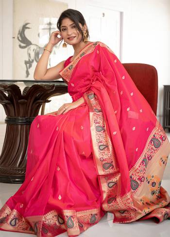 Classic Designer Partywear Saree Are Fine Color Paired With Blouse.This Saree And Blouse Are Banarasi Silk Based Fabric With Heavy Wevon Jari And Meenakari Pallu Border Tassels Designer. Buy This Pretty Saree Now.
