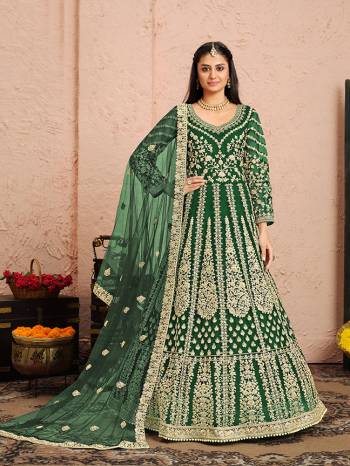 Attrective This Partywear Designer Long Length Suit In Dark Color.Its Pretty Heavy Designer Full Embroidery Work Top Is Net Based Paired With Santoon Bottom And Net  Fabricated Dupatta Which Gives An Attractive To The Suit.