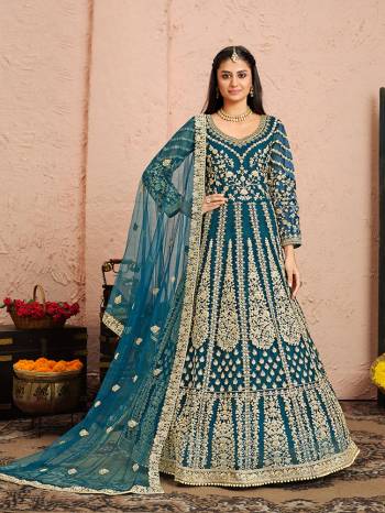 Attrective This Partywear Designer Long Length Suit In Dark Color.Its Pretty Heavy Designer Full Embroidery Work Top Is Net Based Paired With Santoon Bottom And Net  Fabricated Dupatta Which Gives An Attractive To The Suit.