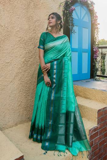 Looking This Designer Partywear Saree Are Fine Saree Paired With Blouse.This Saree And Blouse Are Raw Silk Based Fabric With Heavy Wevon Jari Checks,Temple Designer Work. Buy This Pretty Saree Now.