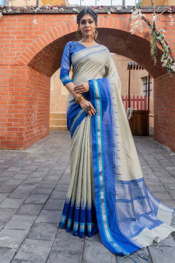 Looking This Designer Partywear Saree Are Fine Saree Paired With Blouse.This Saree And Blouse Are Raw Silk Based Fabric With Heavy Wevon Jari Checks,Temple Designer Work. Buy This Pretty Saree Now.