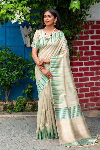 Classic Designer Partywear Saree Are Fine Saree Paired With Blouse.This Saree And Blouse Are Tussar Silk Based Fabric With Heavy Wevon ,ikkat Border,Pallu Tassels Designer. Buy This Pretty Saree Now.