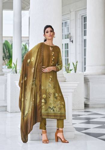 This Designer Suits In Lovely Dusty Color.?Its Pretty Designer Digital Printed With Embroidery Work Top Is Viscose Muslin Based Paired Bottom Santoon With Viscose Muslin Fabricated Dupatta Which Gives An Attractive To The Dress.Buy Now.