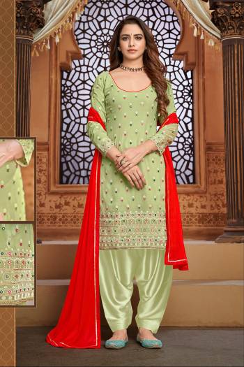 Garb This Designer Patiyala Suit In Fine Color.Its Pretty Heavy Designer Thread,Mirror Embroidery Work Top Is Faux Georgette Based Paired With Santoon Bottom And Maznin Fabricated Dupatta Which Gives An Attractive To The Suit.