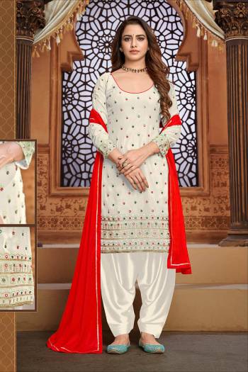 Garb This Designer Patiyala Suit In Fine Color.Its Pretty Heavy Designer Thread,Mirror Embroidery Work Top Is Faux Georgette Based Paired With Santoon Bottom And Maznin Fabricated Dupatta Which Gives An Attractive To The Suit.