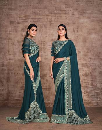 Garb This Wedding Partywear Stylist Designer Fine Colour Saree Paired With Blouse.This Saree And Blouse Are Heavy Fancy Silk Fabric With Heavy Designer Embroidery Work. Buy This Pretty Saree Now.