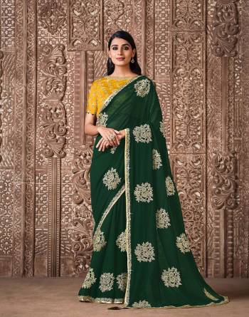 Garb This Wedding Partywear Stylist Designer Fine Colour Saree Paired With Blouse.This Saree And Blouse Are Heavy Fancy Silk Fabric With Heavy Designer Embroidery Work. Buy This Pretty Saree Now.