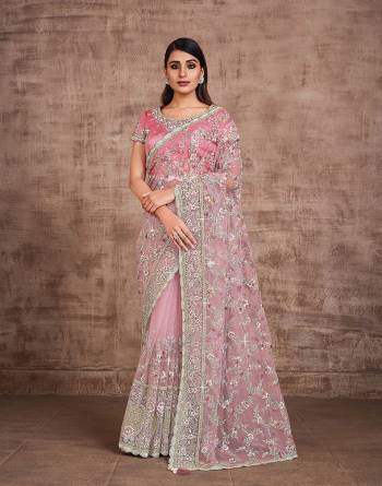 Garb This Wedding Partywear Stylist Designer Fine Colour Saree Paired With Blouse.This Saree And Blouse Are Heavy Fancy Silk Fabric With Heavy Designer Embroidery Work. Buy This Pretty Saree Now.