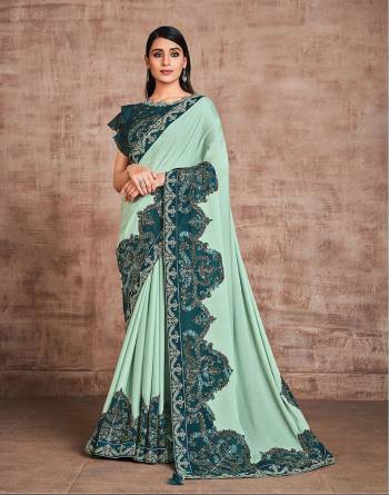 Garb This Wedding Partywear Stylist Designer Fine Colour Saree Paired With Blouse.This Saree And Blouse Are Heavy Fancy Silk Fabric With Heavy Designer Embroidery Work. Buy This Pretty Saree Now.