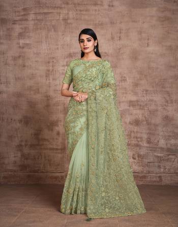 Garb This Wedding Partywear Stylist Designer Fine Colour Saree Paired With Blouse.This Saree And Blouse Are Heavy Fancy Silk Fabric With Heavy Designer Embroidery Work. Buy This Pretty Saree Now.