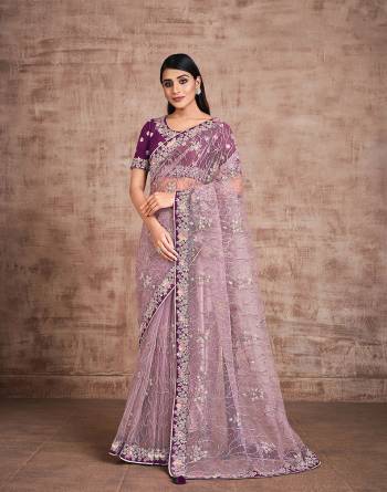 Garb This Wedding Partywear Stylist Designer Fine Colour Saree Paired With Blouse.This Saree And Blouse Are Heavy Fancy Silk Fabric With Heavy Designer Embroidery Work. Buy This Pretty Saree Now.