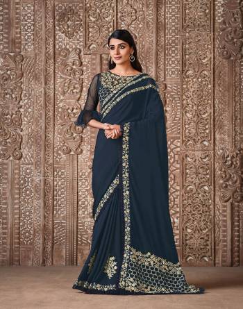 Garb This Wedding Partywear Stylist Designer Fine Colour Saree Paired With Blouse.This Saree And Blouse Are Heavy Fancy Silk Fabric With Heavy Designer Embroidery Work. Buy This Pretty Saree Now.