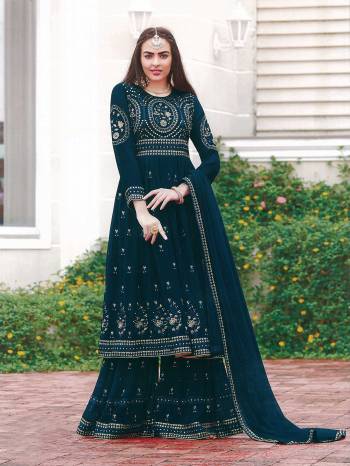 AttrectiveThis Designer Sharara Suit In Lovely Color.Its Pretty Heavy Designer Thread,Sequance Embroidery Work Top Is Faux Georgette Based Paired With Faux Georgette Bottom And Soft Net Fabricated Dupatta Which Gives An Attractive To The Suit.