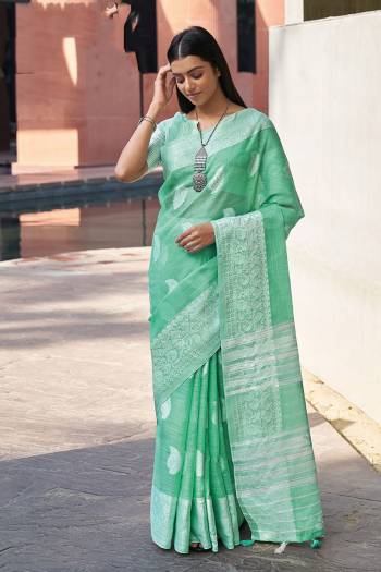 Attrective This Partywear Saree Paired With Blouse.This Saree And Blouse Are Linen Based Fabric With Thread Weaving Designer. Buy This Pretty Saree Now.