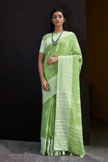 Attrective This Partywear Saree Paired With Blouse.This Saree And Blouse Are Linen Based Fabric With Thread Weaving Designer. Buy This Pretty Saree Now.