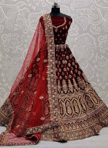 Look Attrective This Wedding Partywear Heavy Designer Lehenga Choli And Dupatta In Fine Color Fabricated On Velvet Beautified With Heavy Attractive Dori,Thread Embroidery,Diamond Work.Buy Now. 