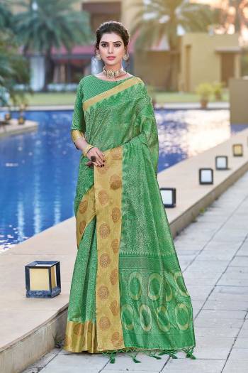 Looking This Designer Traditional Partywear Saree Are Fine Saree Paired With Blouse.This Saree And Blouse Are Organza Based Fabric With Wevon Designer. Buy This Pretty Saree Now.