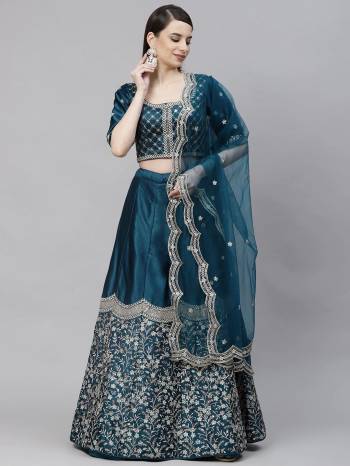 Garb This Wedding Partywear Heavy Designer Lehenga Choli And Dupatta In Fine Color Fabricated On Silk Beautified With Heavy Attractive Thread,Sequance Embroidery Work. 