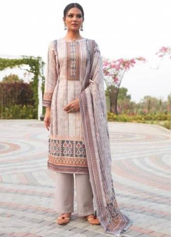 Garb This Designer Long Length Suit In Lovely Dusty Color.Its Pretty Designer Digital Printed With Swaroski Work Top Is Jam Satin Based Paired With Cotton Bottom And Muslin Fabricated Dupatta Which Gives An Attractive To The Suit.