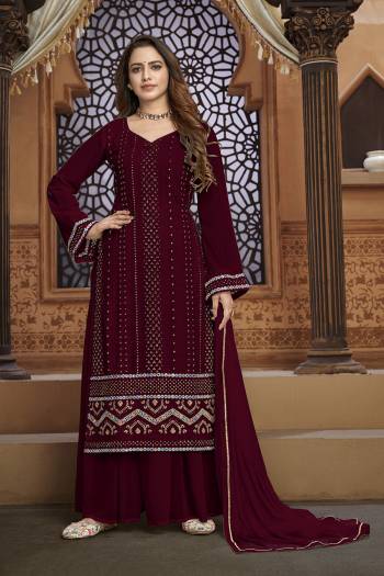 Garb This Designer Sharara Suit In Fine Color.Its Pretty Heavy Designer Thread,Mirror Embroidery Work Top Is Faux Georgette Based Paired With Faux Georgette Bottom And Naznin Fabricated Dupatta Which Gives An Attractive To The Suit.