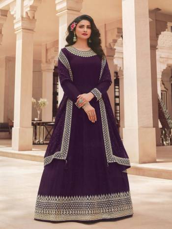 Look Attrctive This Designer Long Suit In Lovely Color.Its Pretty Heavy Designer Embroidery Work Top Is Faux Georgette Based Paired With Santoon Bottom And Faux Georgette Fabricated Dupatta Which Gives An Attractive To The Suit.