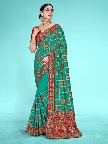 Garb This Heavy Designer Traditional Embroidery Work Saree In Fine Color Paired With Blouse. This Saree And Blouse Is Satin Silk Fabricated. Its Pretty Color Pallete Will Give An Attractive Look To Your Personality. 