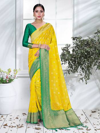 AttrectiveThis Pretty Angelic Partywear Look Wearing This Heavy Designer Weaving Work Saree In Fine Color Paired With Contrasted Blouse. This Saree And Blouse Is Organza Silk Fabricated.Attractive Look To Your Personality. 