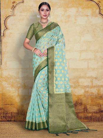 AttrectiveThis Pretty Angelic Partywear Look Wearing This Heavy Designer Weaving Work Saree In Fine Color Paired With Contrasted Blouse. This Saree And Blouse Is Organza Silk Fabricated.Attractive Look To Your Personality. 