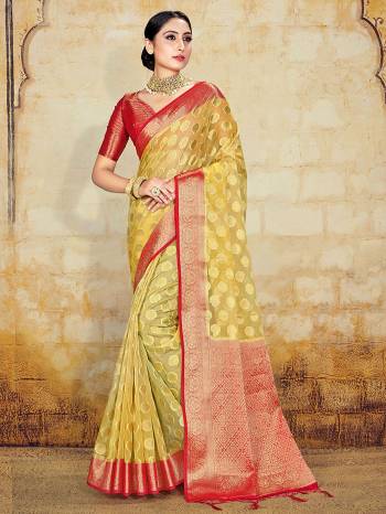AttrectiveThis Pretty Angelic Partywear Look Wearing This Heavy Designer Weaving Work Saree In Fine Color Paired With Contrasted Blouse. This Saree And Blouse Is Organza Silk Fabricated.Attractive Look To Your Personality. 