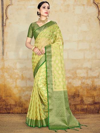 AttrectiveThis Pretty Angelic Partywear Look Wearing This Heavy Designer Weaving Work Saree In Fine Color Paired With Contrasted Blouse. This Saree And Blouse Is Organza Silk Fabricated.Attractive Look To Your Personality. 