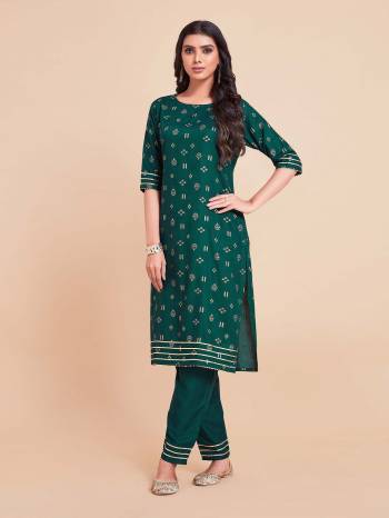 Garb This Readymade Long Dress In Fine Color Top And Bottom Are Rayon Fabricated Beautified With Designer Foil Printed. It Is Light In Weight And Easy To Carry All Day Long. 