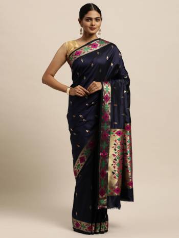 Garb This Traditional Saree Paired With Blouse.This Saree And Blouse Are Silk Based Fabric With Wevon Designer Work. Buy This Pretty Saree Now.