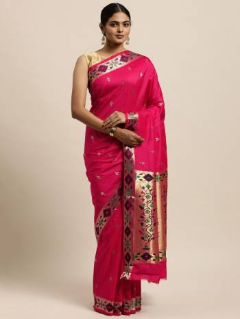 Garb This Traditional Saree Paired With Blouse.This Saree And Blouse Are Silk Based Fabric With Wevon Designer Work. Buy This Pretty Saree Now.