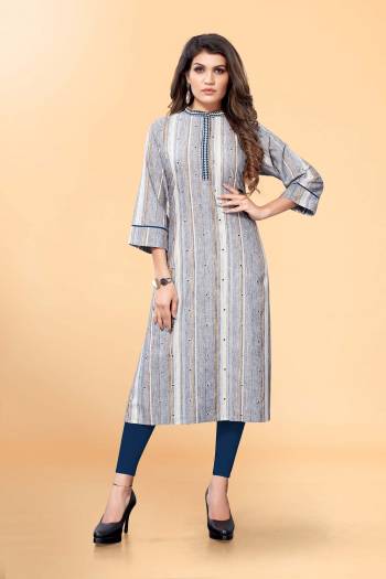 Garb This Readymade Long Dress In Fine Color Kurti Are Cotton Blend Fabricated Beautified With Designer Wevon With Embroidery Work. It Is Light In Weight And Easy To Carry All Day Long. 