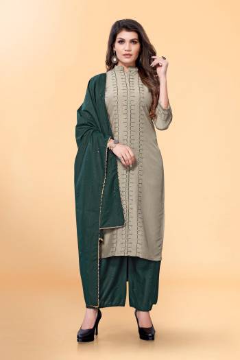 Garb This Readymade Long Dress In Fine Color Plazzo Suits.Kurti,Bottom And Dupatta Are Silk Blend Fabricated Beautified With Designer Thread Embroidery Work. It Is Light In Weight And Easy To Carry All Day Long. 