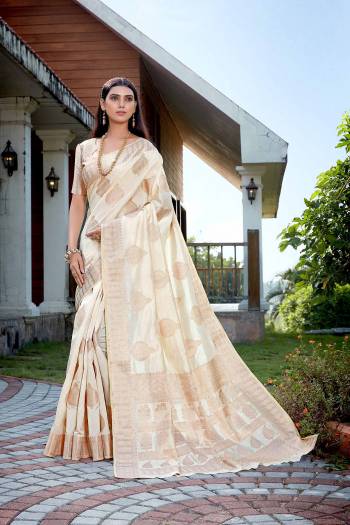 Looking This Stylist Partywear Saree Are Fine Light Color Paired With Blouse.This Saree And Blouse Are Raw Silk Fabric With Heavy Jari Weaving Designer. Buy This Pretty Saree Now.