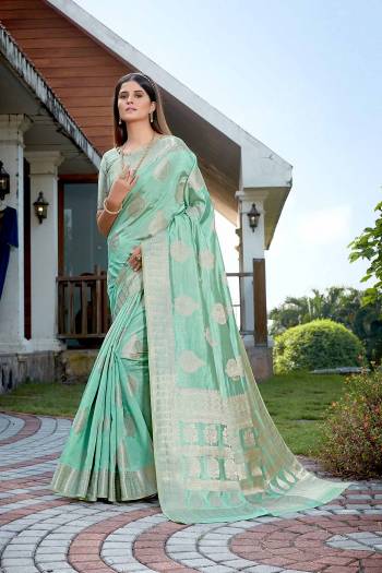 Looking This Stylist Partywear Saree Are Fine Light Color Paired With Blouse.This Saree And Blouse Are Raw Silk Fabric With Heavy Jari Weaving Designer. Buy This Pretty Saree Now.