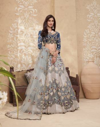 Garb This Designer Lehenga Choli In Fine Color Fabricated On Silk Beautified Fabric Lahenga Choli With Designer Heavy Thread,Mette Embroidery,Zarkan Work.Buy Now. 