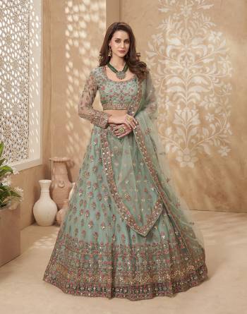 Garb This Designer Lehenga Choli In Fine Color Fabricated On Net Beautified Fabric Lahenga Choli With Designer Heavy Thread,Mette Embroidery Work.Buy Now. 