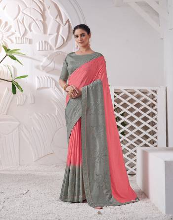 Garb This Partywear Stylist Designer Fine Colour Saree Paired With Blouse.This Saree Are Viscose Silk And Blouse Are Raw Silk Fabric With Heavy Designer Embroidery Work. Buy This Pretty Saree Now.