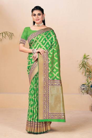 Attrective This Traditional Saree Paired With Blouse.This Saree And Blouse Are Banarasi Silk Based Fabric With Wevon Designer Jari Work. Buy This Pretty Saree Now.